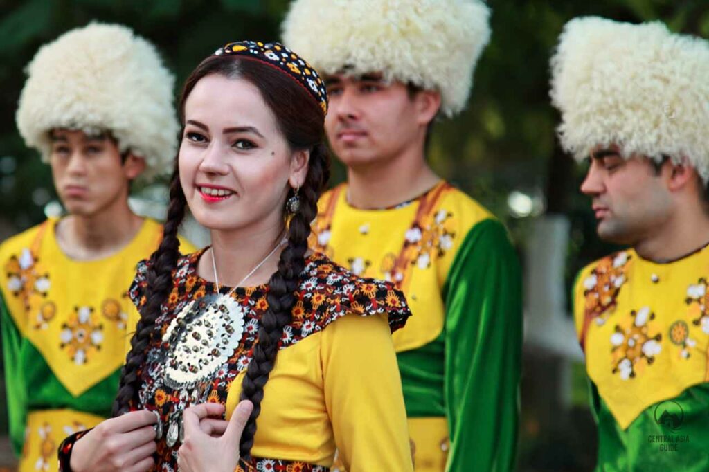 Group of Turkmen dancers wearing traditional celebratory clothes in Ashgabat