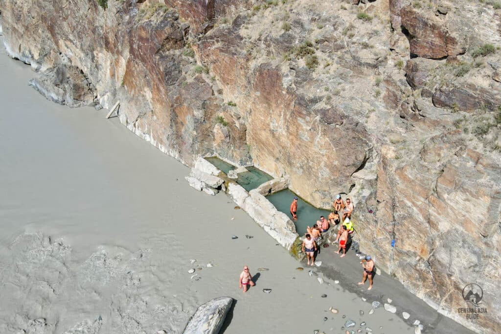 Kara Tash wild hot spring in Engilchek, next to Sary jaz river in Kyrgyzstan