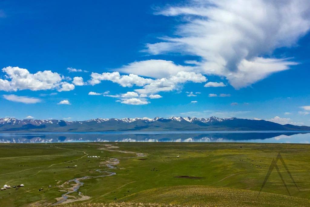 Son Kul lake view with yurts and animals